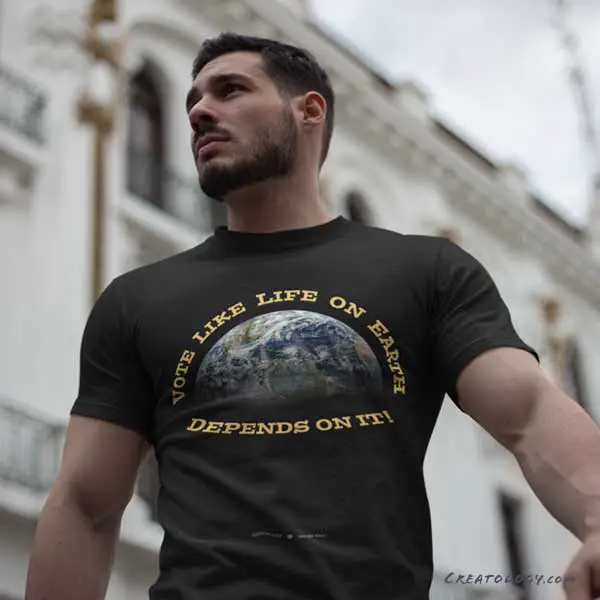 An EarthMart t-shirt with the message, ‘Vote Like Life on Earth Depends on It,’ is modeled by an active male model. [Merch for sale in the EarthMart store at Redbubble]